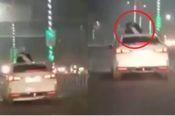 கார் கூரை மீது காதல் ஜோடி கட்டிப்பிடித்து அட்ராசிட்டி - வைரலாகும் வீடியோ!