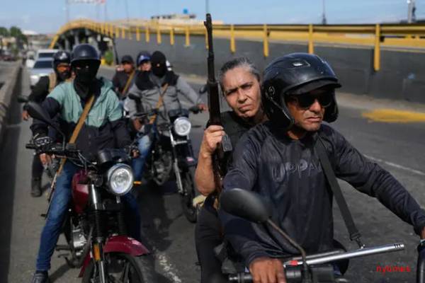 வெனிசுலாவின் கொடூர துணை ராணுவப் படை: குடிமக்களை உடனடியாக வெளியேறச் சொன்ன நாடு | Us Citizens To Flee Venezuela வெனிசுலாவின் கொடூர துணை ராணுவப் படை: குடிமக்களை உடனடியாக வெளியேறச் சொன்ன நாடு | Us Citizens To Flee Venezuela