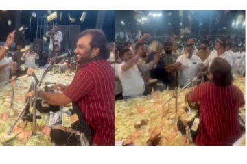 அடேங்கப்பா.... மேடையில் பாடகர் மீது பணமழை பொழிந்த மக்கள்.... வைரலாகும் வீடியோ...!