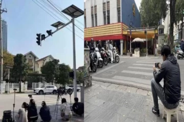 சாலை விதிமீறல் குறித்து தகவலளித்தால் ரூ.17,000 பரிசு - கேமரா உடன் சாலையில் அமர்ந்த மக்கள்