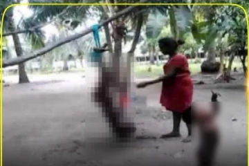 பிள்ளைகளை மரத்தில் தொங்கவிட்டு சித்திரவதை: தாய் கைது