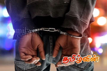 துப்பாக்கிகளுடன் வங்கி ஊழியர் ஒருவர் கைது