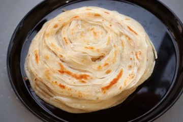 சூடாக ஹோட்டல் சுவையில் கோதுமை பரோட்டா...வீட்டிலேயே செய்வது எப்படி?