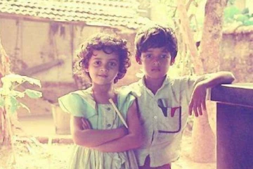 இந்த போட்டோவில் இருக்கும் குழந்தை யார் தெரியுமா? அஜித்துக்கே ஜோடியாக நடித்த நடிகை தான்