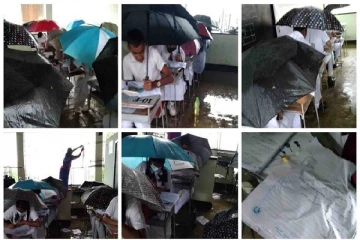 குடைபிடித்து பரீட்சை எழுதிய மாணவர்கள் -கல்வியமைச்சு வெளியிட்ட அறிவிப்பு