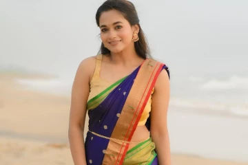 காவ்யா அறிவுமணி சேலையில் அழகிய பீச் போட்டோஷூட்