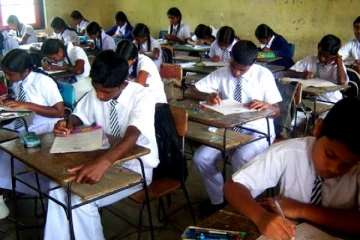 விடைத்தாள் திருத்தப்பணிகளுக்காக செலுத்தப்படும் கட்டணத்தில் திருத்தம்