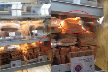 எலி ஊர்ந்து செல்லும் பப்ஸ்; ரயில் நிலையத்தில் அதையும் விற்கும் கடைக்காரர் - வைரல் வீடியோ