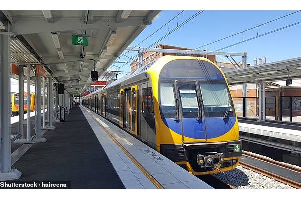 british man compare train ticket in australia