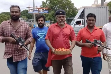 எகிறிய தக்காளி விலை ; துப்பாக்கியுடன் ஆட்சியர் அலுவலகத்திற்கு சென்ற நபரால் பரபரப்பு