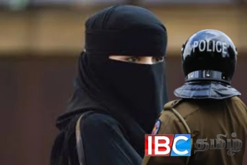 பர்தா அணிந்து நகரத்தில் சுற்றித்திரிந்த மாணவன் கைது