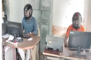 அரசு அலுவலகத்திற்குள் ஹெல்மெட் போட்டு வேலை பார்க்கும் ஊழியர்கள் - காரணம் இதுதான்!