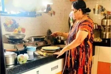 ஆக்ஸிஜன் மாஸ்க் உடன் சமையலறையில் பெண்: இணையவாசிகளை மொத்தமாக கொந்தளிக்க வைத்த புகைப்படம்