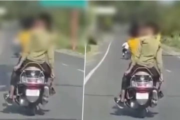 மோட்டார் சைக்கிளில் வைத்து உதட்டு முத்தம்: வைரலாகும் வீடியோ