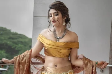 இளம் நடிகை ஸ்ரீலீலா தங்க நிற உடையில் அழகிய போட்டோஷூட்