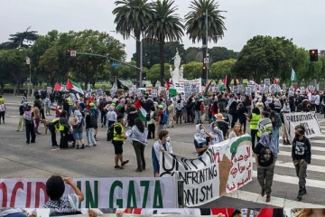 இஸ்ரேலிய பிரதமர் நியுயோர்க் விஜயம் ; சிறுவர்களை கொலை செய்யாதே!ஆர்ப்பாட்டங்கள்