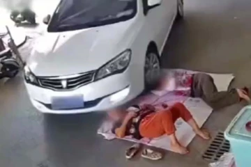 பெண்ணின் கழுத்தில் ஏறி இறங்கிய கார்: திடுக்கிட வைக்கும் வீடியோ காட்சிகள்