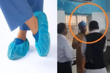 தலையில் ஷூ கவரை அணிந்த அமைச்சர்..வைரலாகும் புகைப்படம் - கலாய்க்கும் நெட்டிசன்கள்!