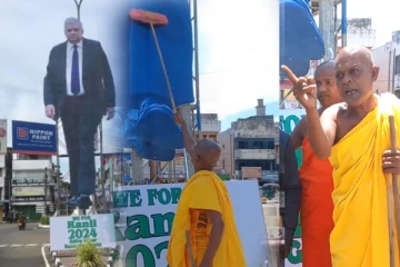 மட்டக்களப்பில் தும்புத்தடியுடன் தேரர் அடாவடி; ஜனாதிபதி கட் அவுட் முன்னால் ஆர்ப்பாட்டம்