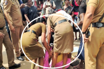 கிளிநொச்சி போராட்டத்தில் மயங்கி விழுந்த பெண்; ஓடிவந்து உதவிய பொலிஸார்