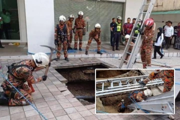 திடீரென உள்வாங்கிய நடைபாதை: குழிக்குள் மூழ்கிய பெண்ணை மீட்கும் பணி தீவிரம்!