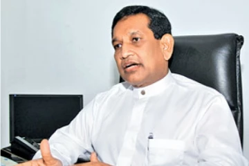 மொட்டு கட்சியை ரணிலிடம் ஒப்படைக்க வேண்டும் : ராஜித சேனாரட்ன சுட்டிக்காட்டு