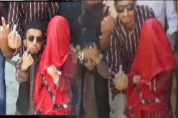 இரண்டரை அடி கணவன் மூன்றடி உயரமுள்ள மனைவியோடு வந்து வாக்களிப்பு - வைரலாகும் வீடியோ