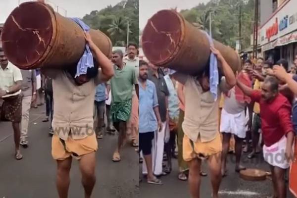 பாகுபலி போல் 300 கிலோ கட்டையை தோளில் சுமந்து சென்ற நபர் - இணையத்தை கலக்கும் காட்சி! | Kerala Man Lift 300 Kilograms In Shoulder