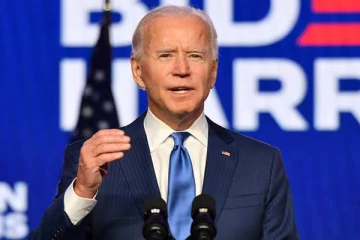 ஜோ பைடன் உரையாற்றிக்கொண்டிருக்கும் போது குறுகிட்ட பெண்