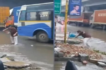 போதை ஏறி போச்சு : கழிவுநீர் கால்வாயில் விழுந்த குடிமகன்  வைரலாகும் புகைப்படம்