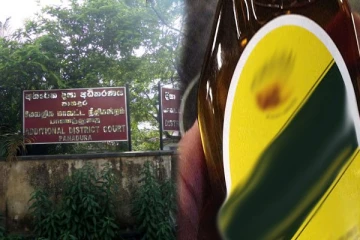 நீதிமன்றத்திற்குள் சாராயத்தை எடுத்துச் செல்ல முயற்சித்த நபர்