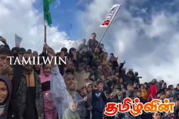 இறந்த இஸ்ரேலியர்களின் உடலின் முன் பலஸ்தீனிய குழந்தைகள் கொண்டாட்டம்