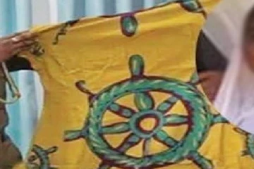 தர்ம சக்கரம் பொறித்த ஆடையால் கைதான பெண் ; உயர் நீதிமன்றம் வழங்கிய அதிரடி தீர்ப்பு