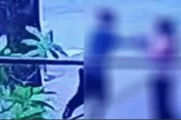 இளைஞனை தாக்கிய கணவனும் மனைவியும்