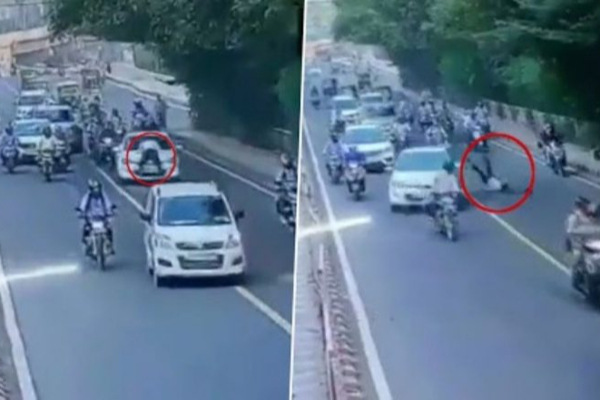 செல்போன் பேசியபடி கரை ஓட்டிய நபர்; பிடிக்க முயன்ற காவலருக்கு நேர்ந்த கதி! | A Person Who Drove Talking Cell Phone Policeman