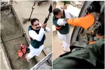 வெள்ளத்தில் மாட்டிக்கொண்ட அமைச்சர்... ஹெலிகாப்டர் மூலம் மீட்ட மீட்புப்படையினர்...