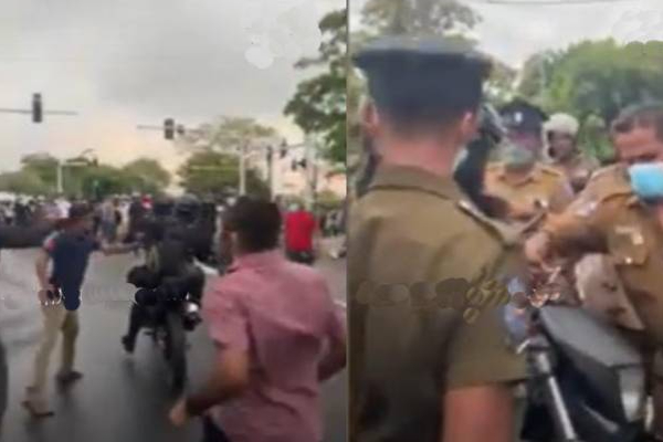 திடீரென நுழைந்த இராணுவ மோட்டார் சைக்கிள் குழுவினரை துரத்திய மக்கள்! | Parliament Street Army Motor Cycle People Attack