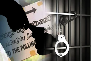 ஜனாதிபதி வேட்பாளரிடம் லஞ்சம் பெற்ற அதிகாரிகள் கைது