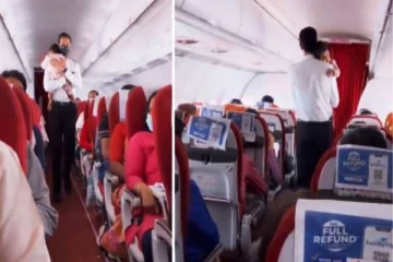 நடுவானில் விமானத்தில் தந்தையாக மாறிய பணியாளர்!