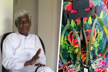 கார்த்திகை மலர் பொறிக்கப்பட்ட பாதணிகள்: அருட்தந்தை மா.சத்திவேல் கேள்வி