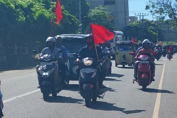 மே தினத்தை முன்னிட்டு யாழில் பவனிவந்த வாகன ஊர்வலம்!(Photos)
