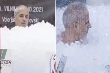 கொட்டும் மழையுடன் 3மணி நேரம் ஐஸ் பெட்டிக்குள் நின்று சாதனை (video)