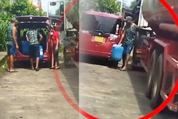 நடு வீதியில் பெண்ணுக்கு திருட்டுத்தனமாக கொடுக்கப்பட்ட எரிபொருள்! வைரலாகும் காணொளி