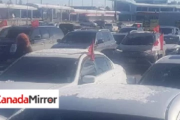 கனடாவில் கொட்டும் பனியில் P2P இற்கு ஆதரவு தெரிவித்து இடம்பெற்ற கார் போராட்டம்