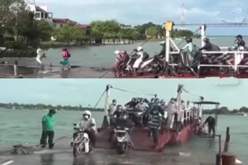 அச்சத்திற்கு மத்தியில் படகுப்பாதையூடாக பயணிக்கும் மக்கள்!