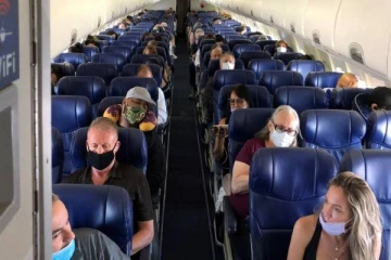 விமானங்களில் முகக் கவசம் அணிவது இனி கட்டாயம் இல்லை!