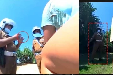 சுற்றுலாப் பயணிகளுக்கு தொந்தரவு செய்யும் இலங்கை பொலிஸ் அதிகாரி! வைரலாகும் காணொளி(Video)