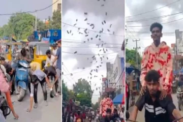 சாலையில் ரூபாய் நோட்டுகளை தூக்கி வீசிய யூடியூபர்..முண்டியடித்து எடுத்த மக்கள் - வைரல் வீடியோ!