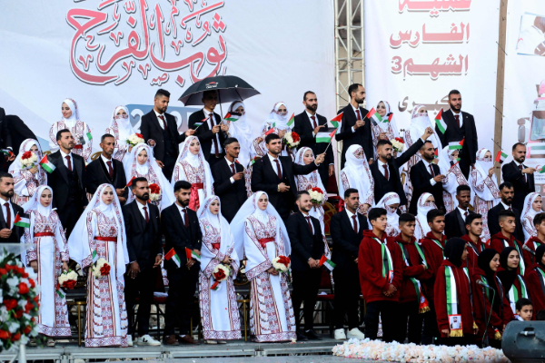 காசாவில் இடிந்த கட்டிடங்களுக்கு நடுவில் 54 ஜோடிகளுக்கு திருமணம்; இணையங்களில் வைரல்! | 54 Couples Wedding Gaza Amidst Collapsed Buildings காசாவில் இடிந்த கட்டிடங்களுக்கு நடுவில் 54 ஜோடிகளுக்கு திருமணம்; இணையங்களில் வைரல்! | 54 Couples Wedding Gaza Amidst Collapsed Buildings