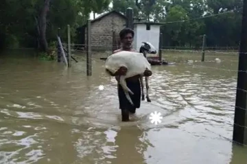 வெள்ளக்காடான கிளிநொச்சி; இன்று விசேட விடுமுறை(Photos)